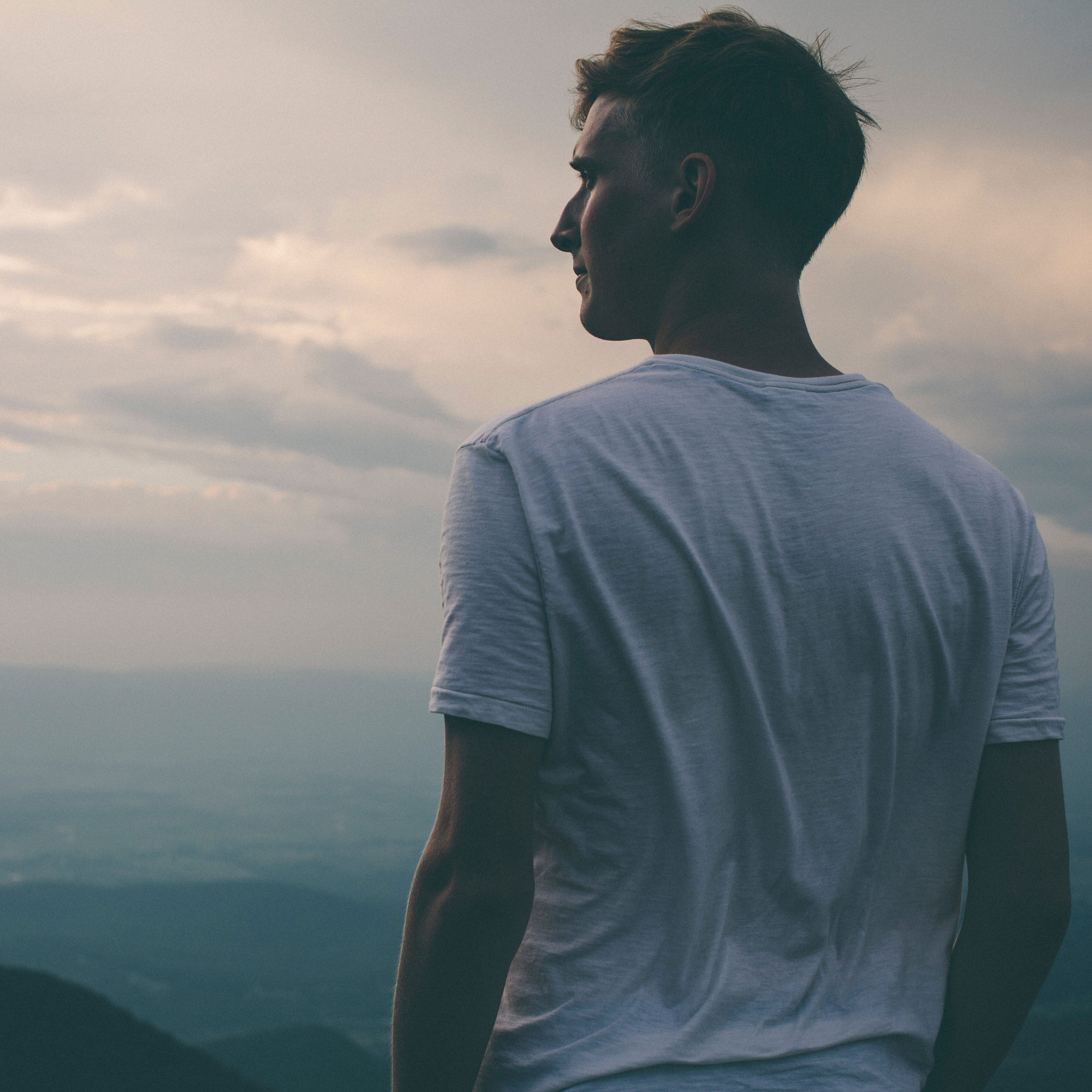 Man looking out onto scenic view