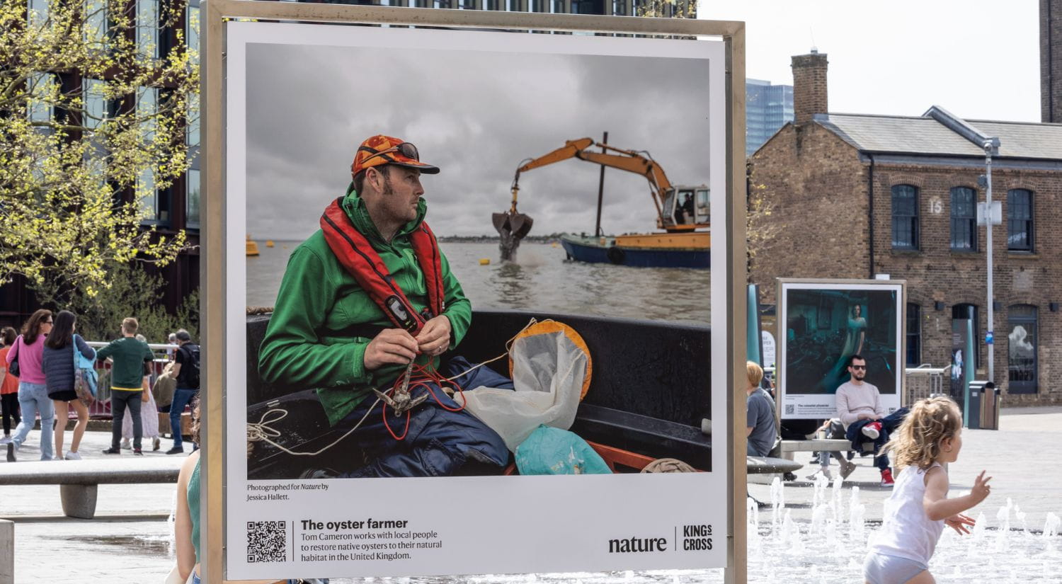 Professor Tom Cameron on his billboard