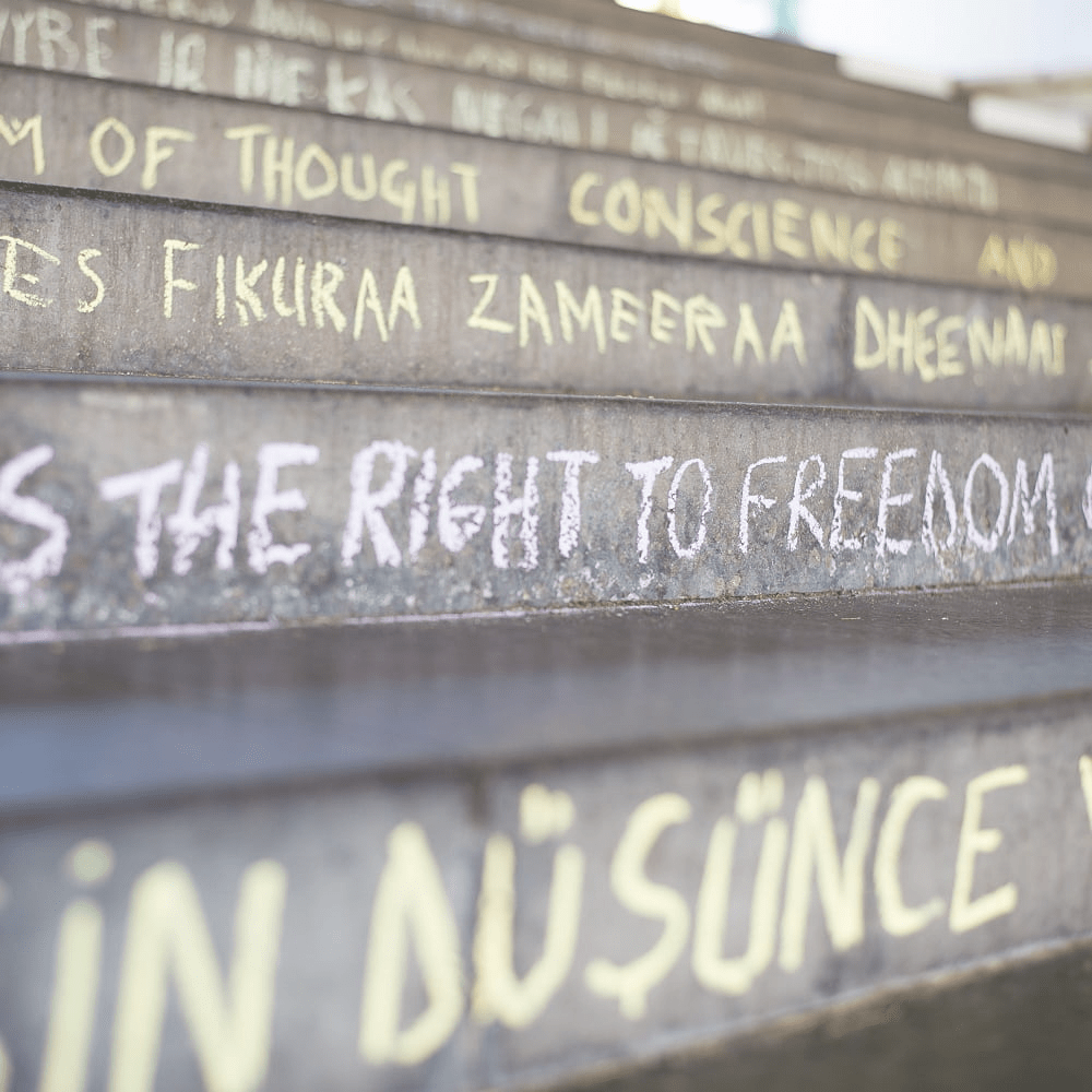 steps with chalk writing 'the right to freedom'