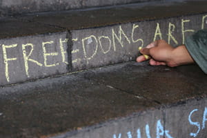 Our students chalk the steps each year with the Universal Declaration of Human Rights