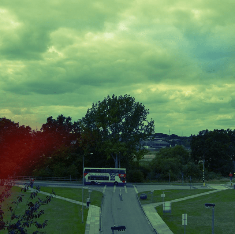 View towards the bus stops by the entrance to under podia