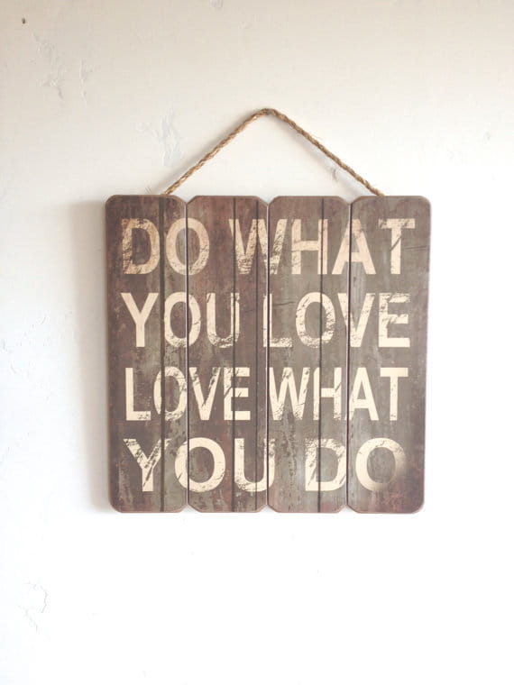 Wall sign reading "Do what you love, love what you do"