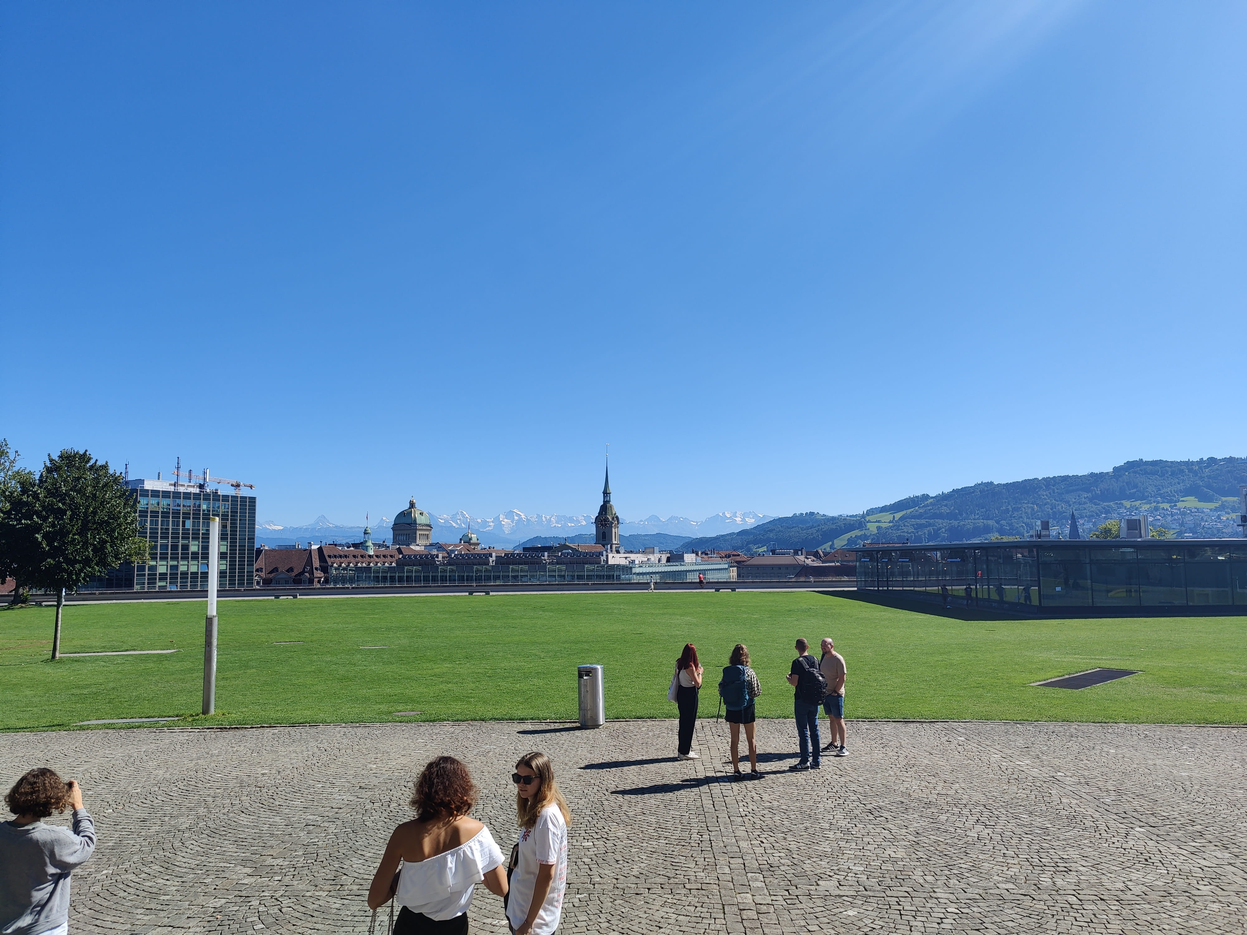 green field with mountain behind it in Switzerland