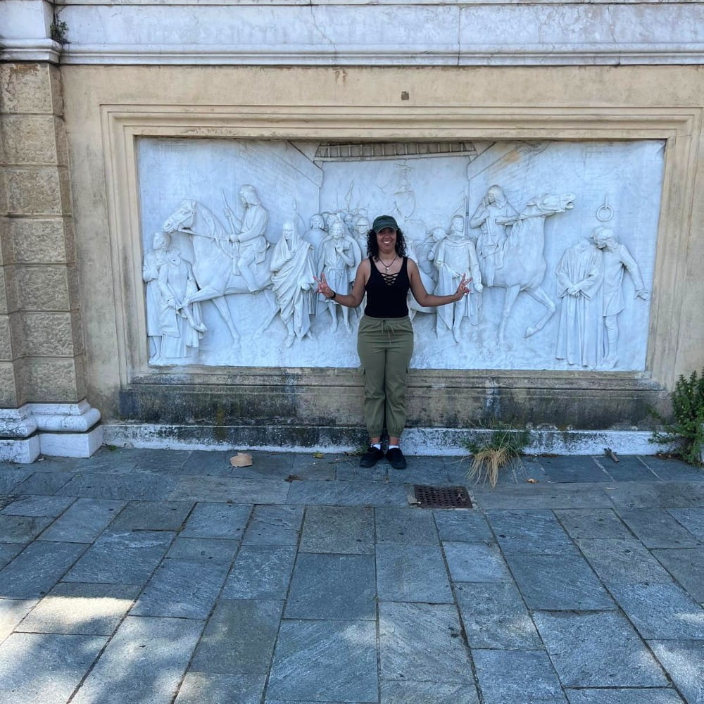Nadia, an Essex Abroad Ambassador poses for a photo in Italy on her year abroad