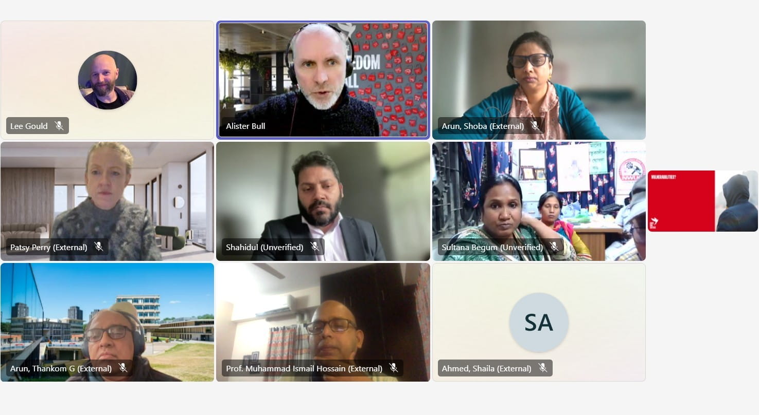 A screencap of a Zoom call showing nine people with various backgrounds.