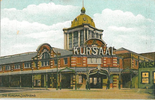 Vintage postcard showing the Kursaal in Southend. This is a red brick building with "Kursaal" in large letters on the facade, and a dome on top.