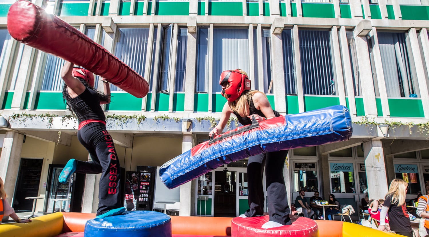 Student's during welcome pillar jousting