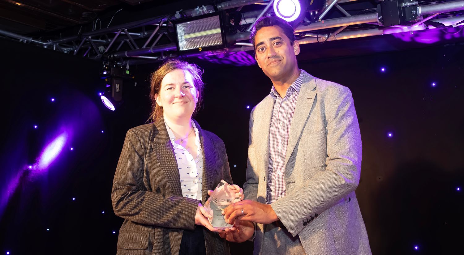 Elizabeth Lee Reynolds receives award from Dr Rob Singh