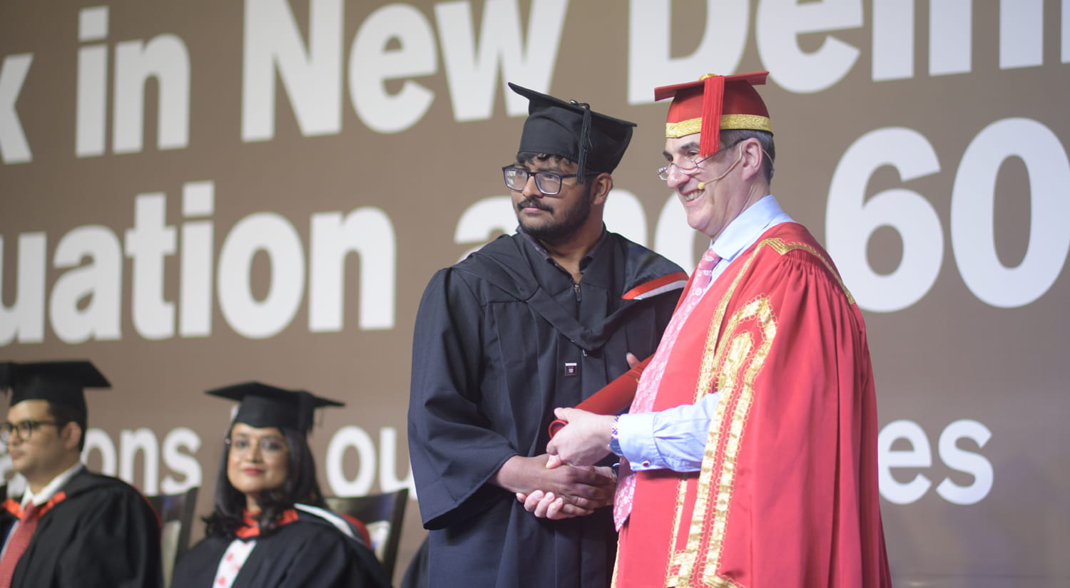 Student at India graduation with Vice-Chancellor