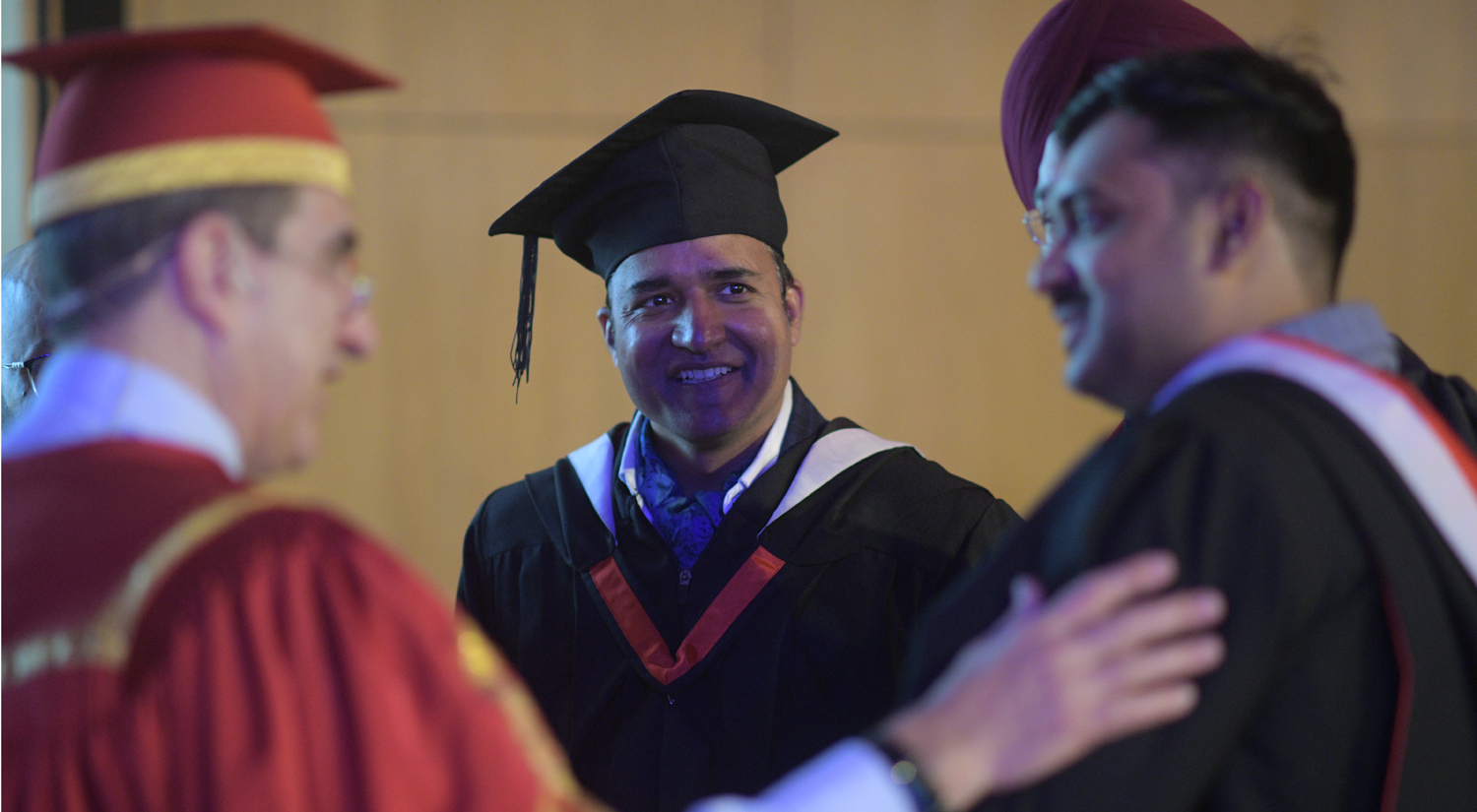 Vice-Chancellor with graduates at India Graduation