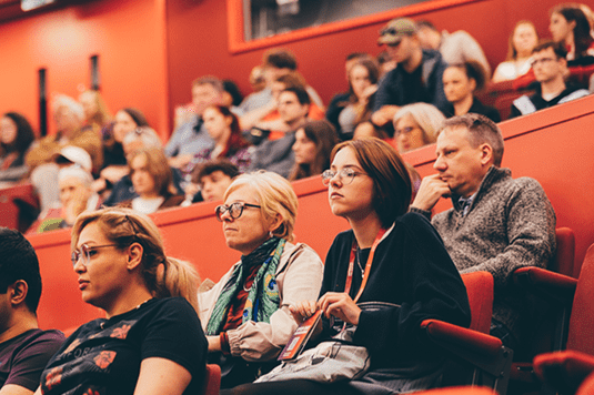 Open Day Attendees at a talk in a lecture hall 