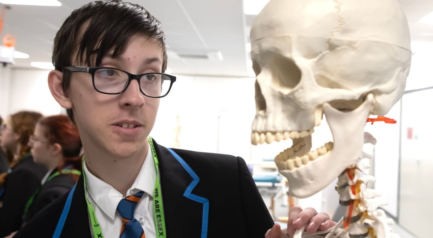 A Harwich and Dovercourt student says hello to a skull
