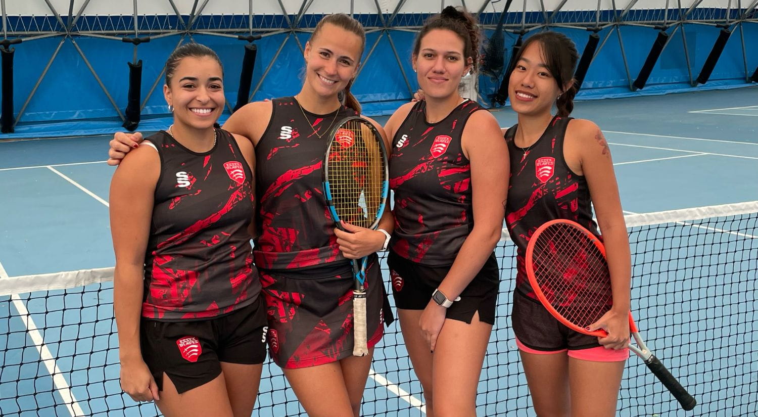 The women's tennis team after winning in Portsmouth 