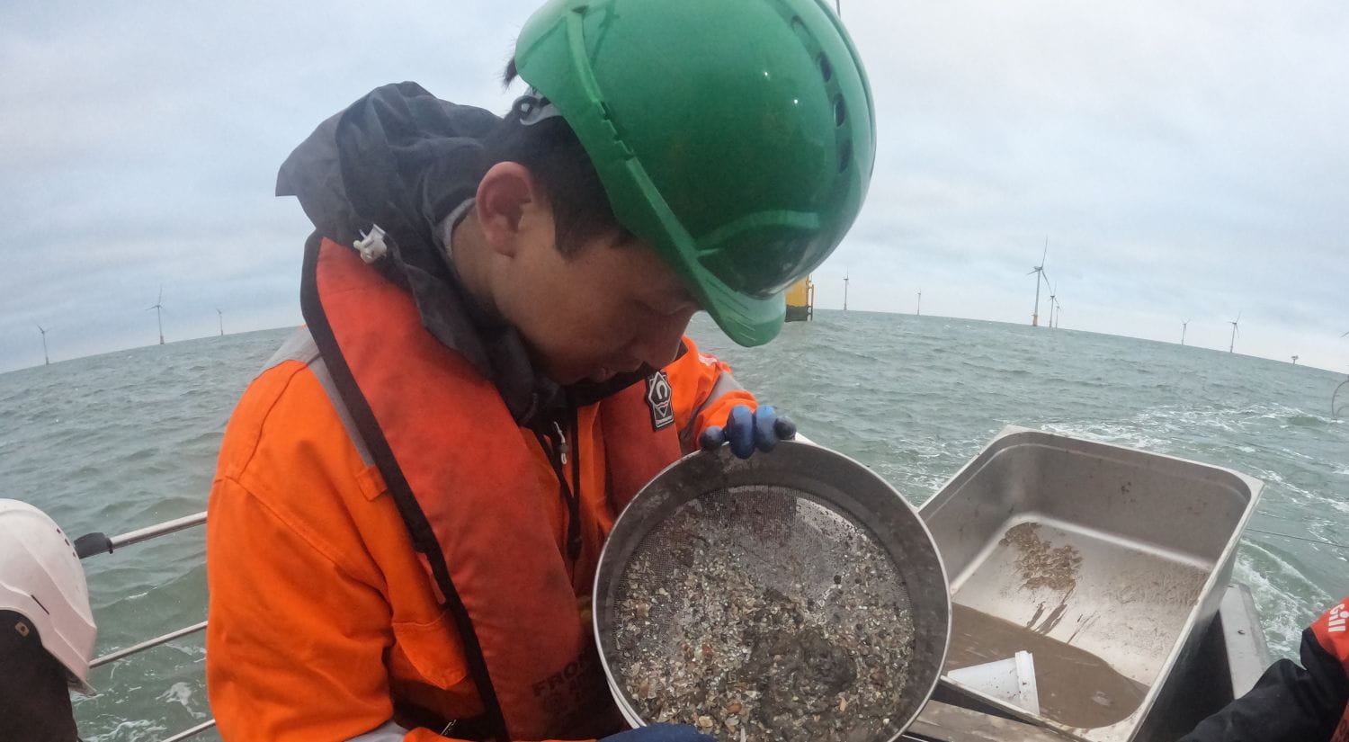 Essex's Zelin Chen examines a seabed sample